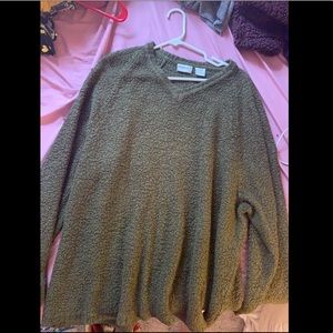 Green V-neck sweater